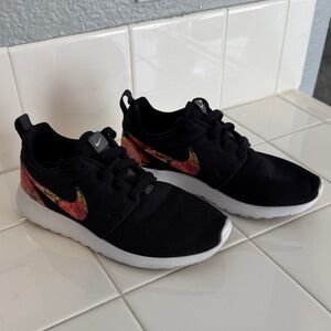 Nike Woman’s Black Sneakers with Floral Swoosh